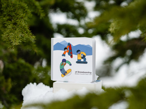 ABC Snowboarding Book in the trees